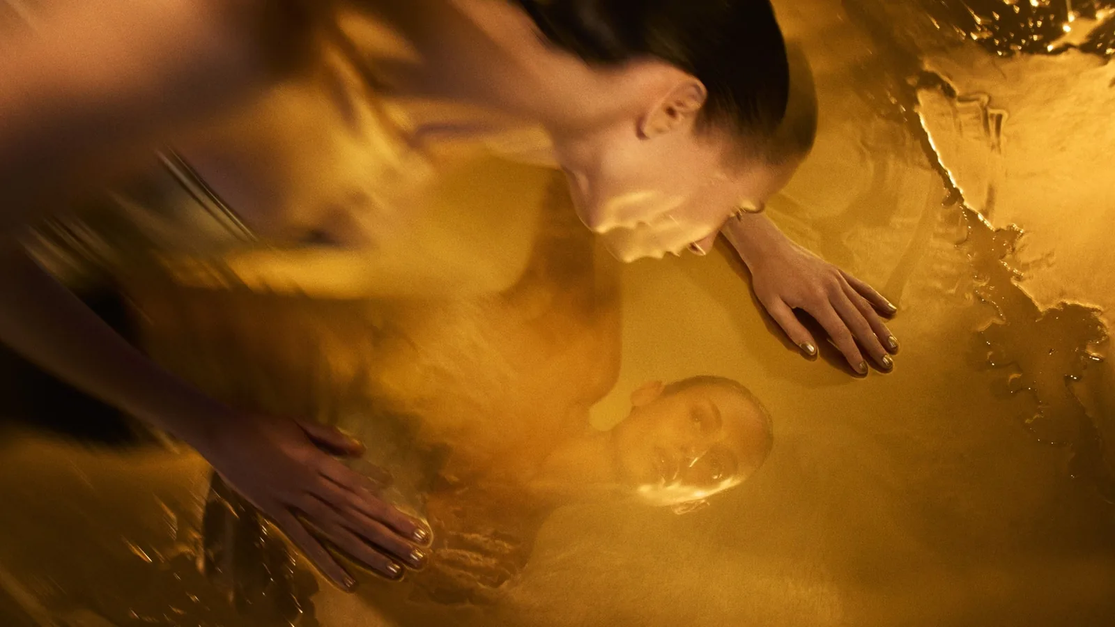 Biologique Recherche Vivant campaign image: a woman reflected in an amber liquid